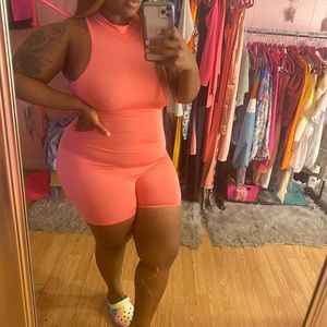 Pink bodysuit from Get Glam’d Boutique